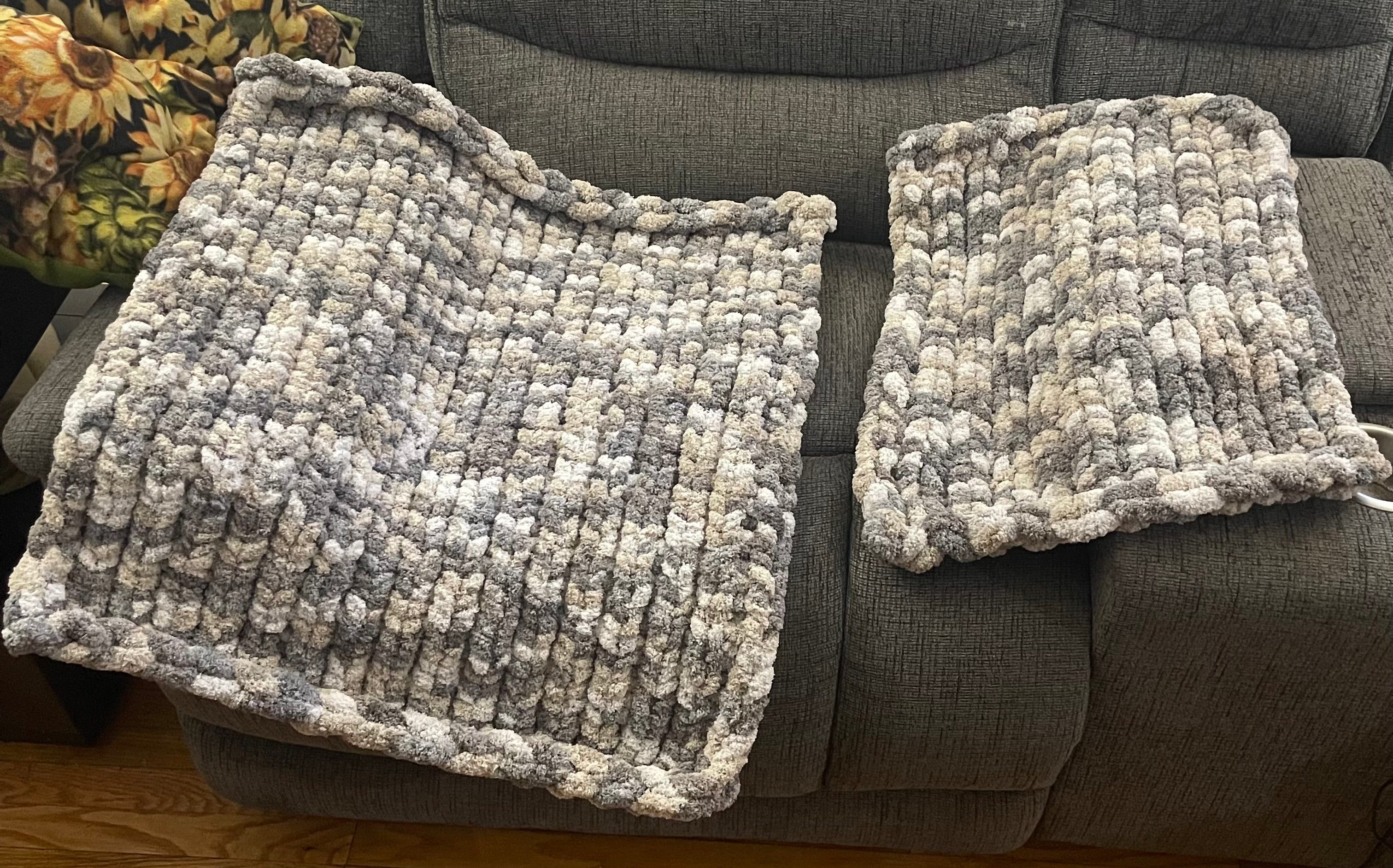 Both are Variegated Gray as Knit Stitch for small pet and medium pet blanket.
